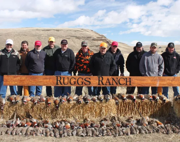 Corporate guests pose at Ruggs Ranch