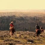 Riders on horseback in nature