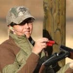 Person preparing for shooting activity.