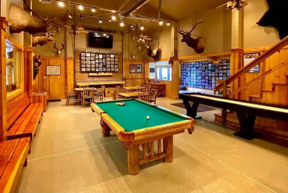 Rustic game room with pool table